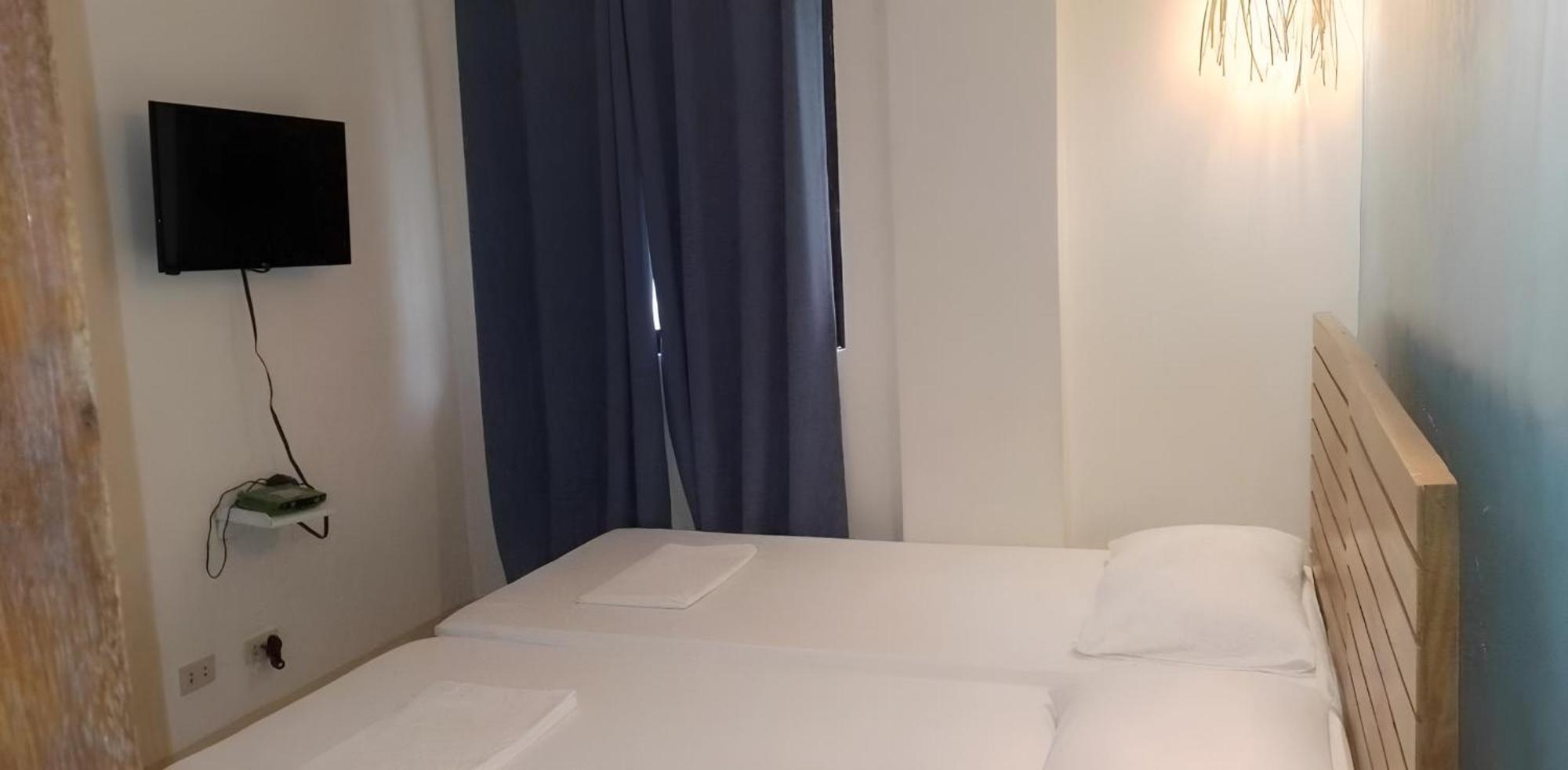 Amos Pili Tree Inn Powered By Cocotel Ел Нидо Екстериор снимка