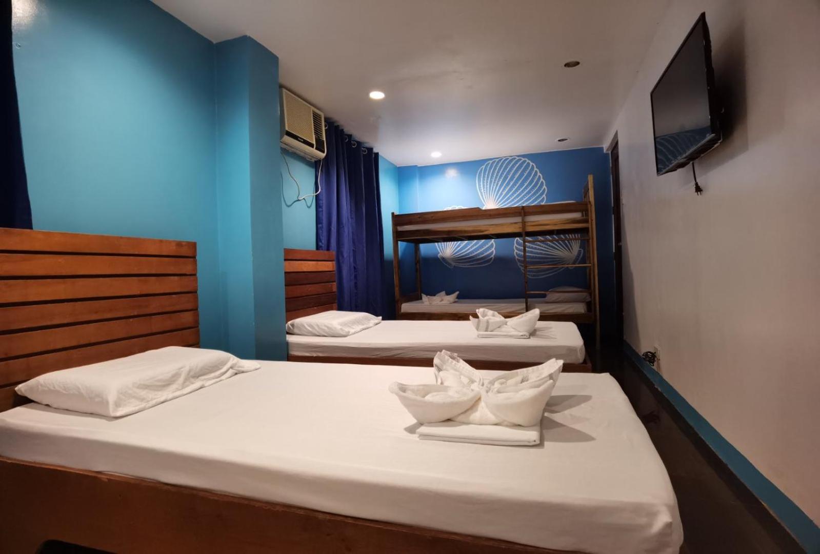 Amos Pili Tree Inn Powered By Cocotel Ел Нидо Стая снимка