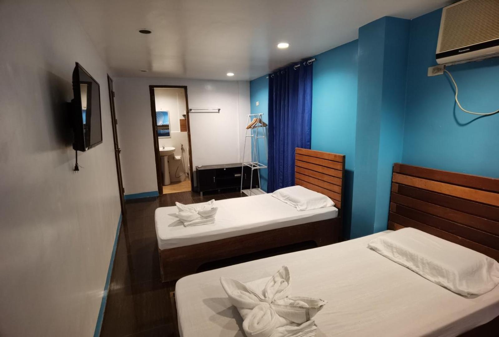 Amos Pili Tree Inn Powered By Cocotel Ел Нидо Стая снимка
