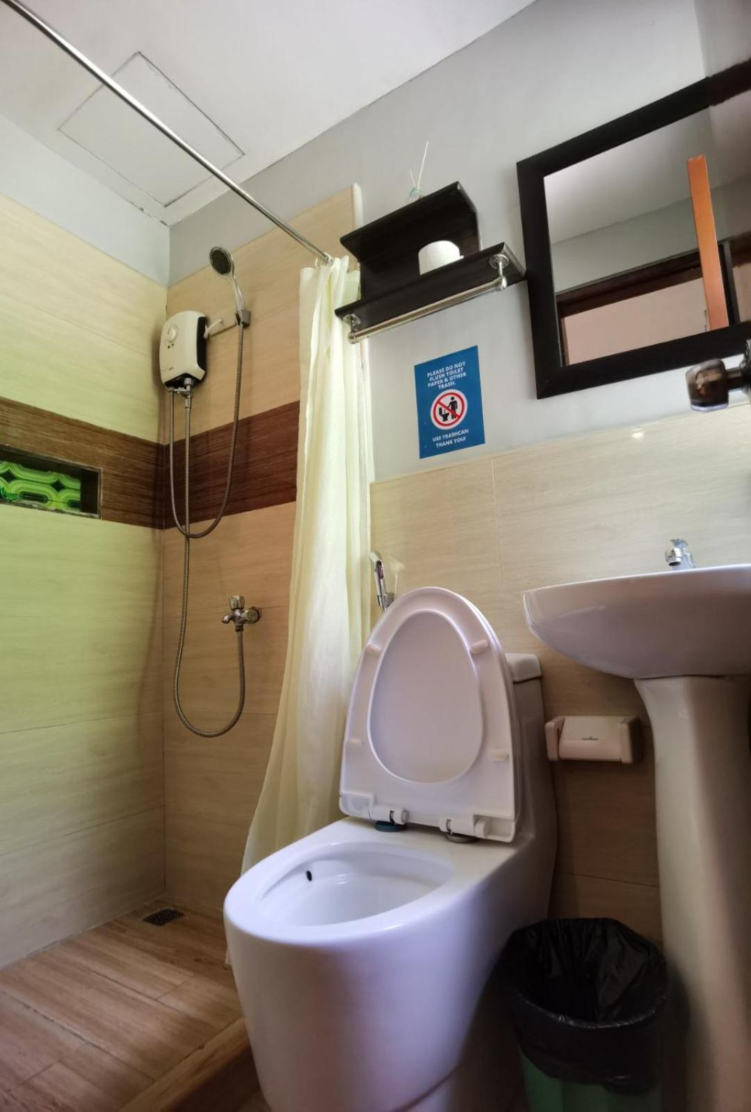 Amos Pili Tree Inn Powered By Cocotel Ел Нидо Стая снимка