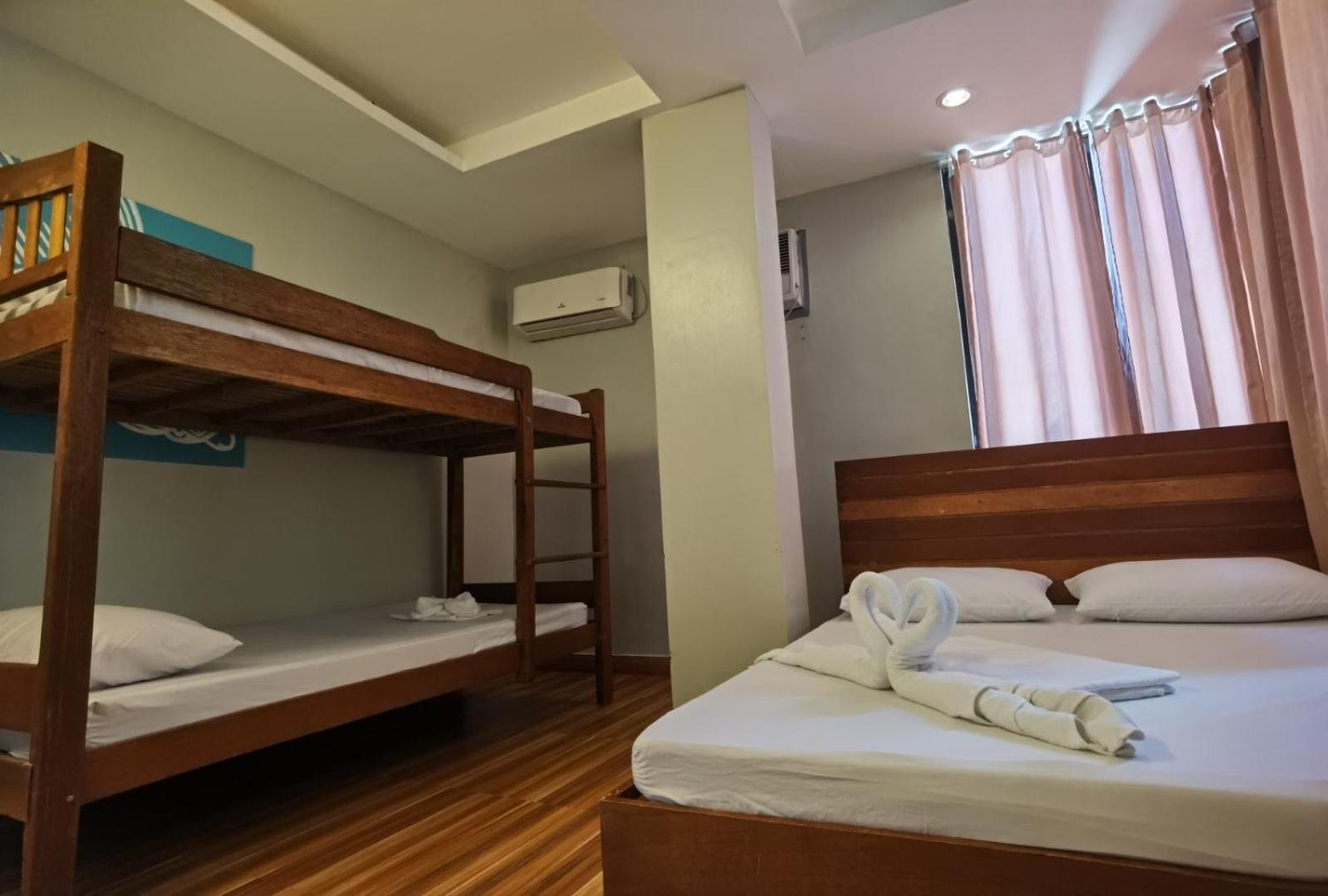 Amos Pili Tree Inn Powered By Cocotel Ел Нидо Стая снимка